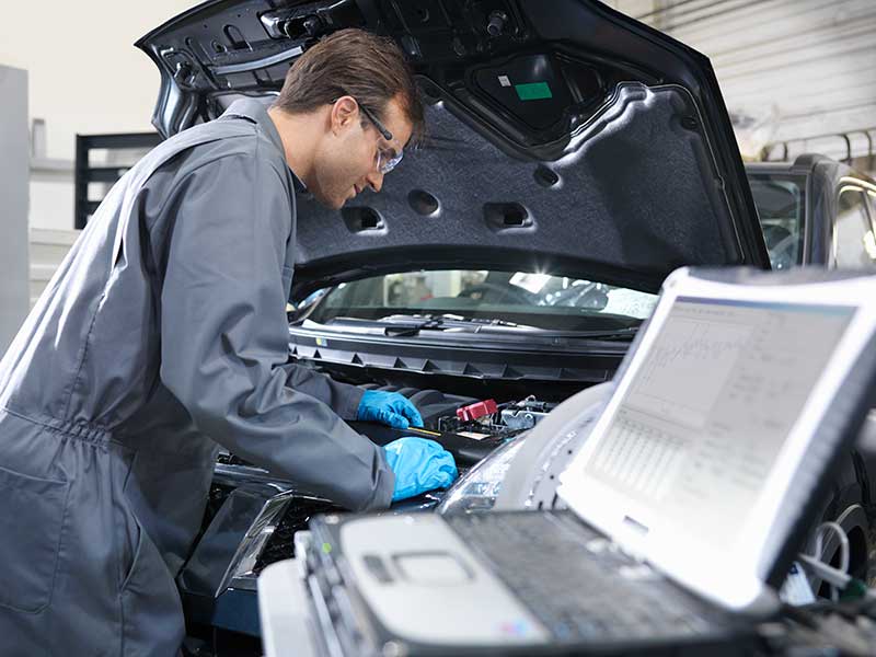 car mechanic working on a car car mechanic working on a car